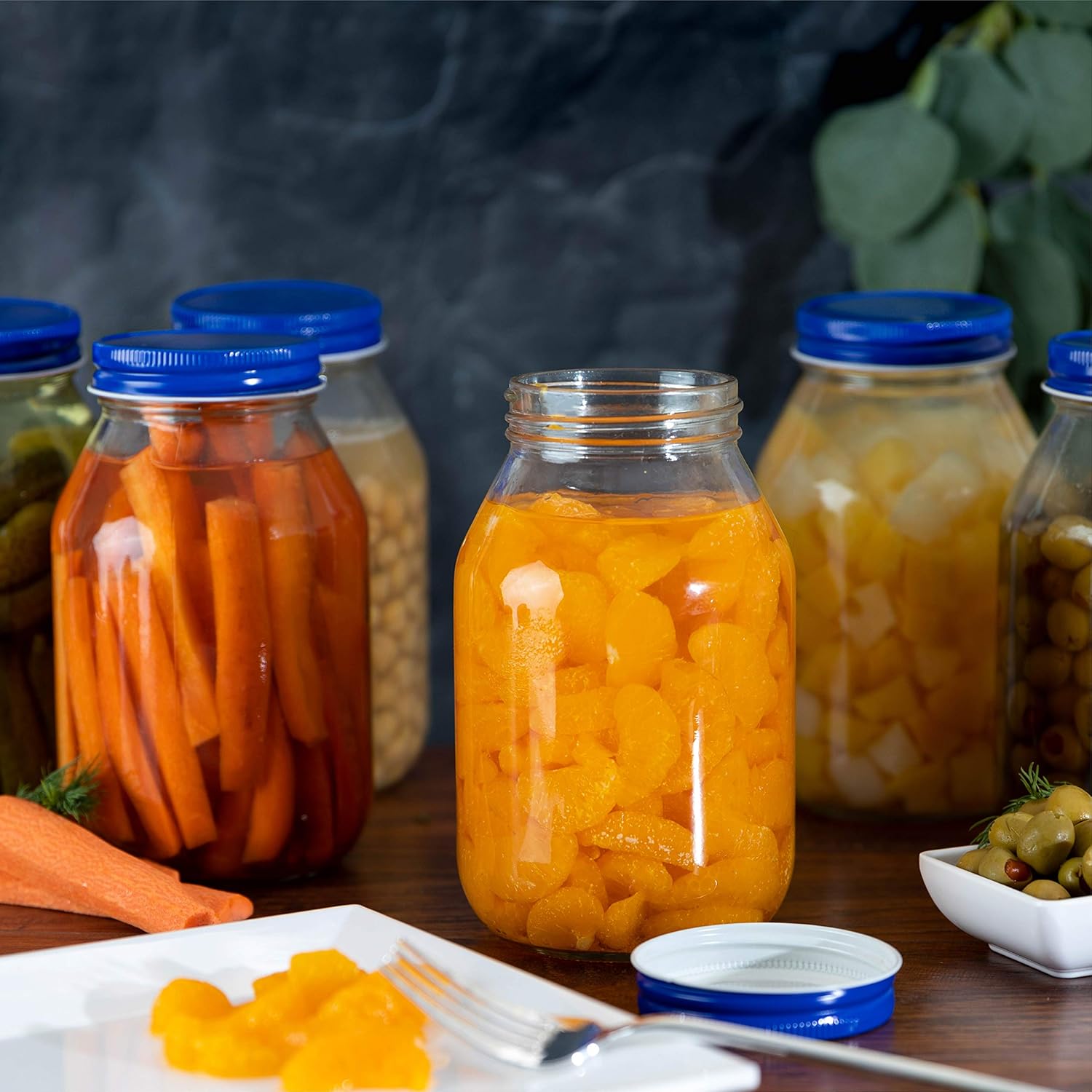 Packstar | quart jars with a dark background